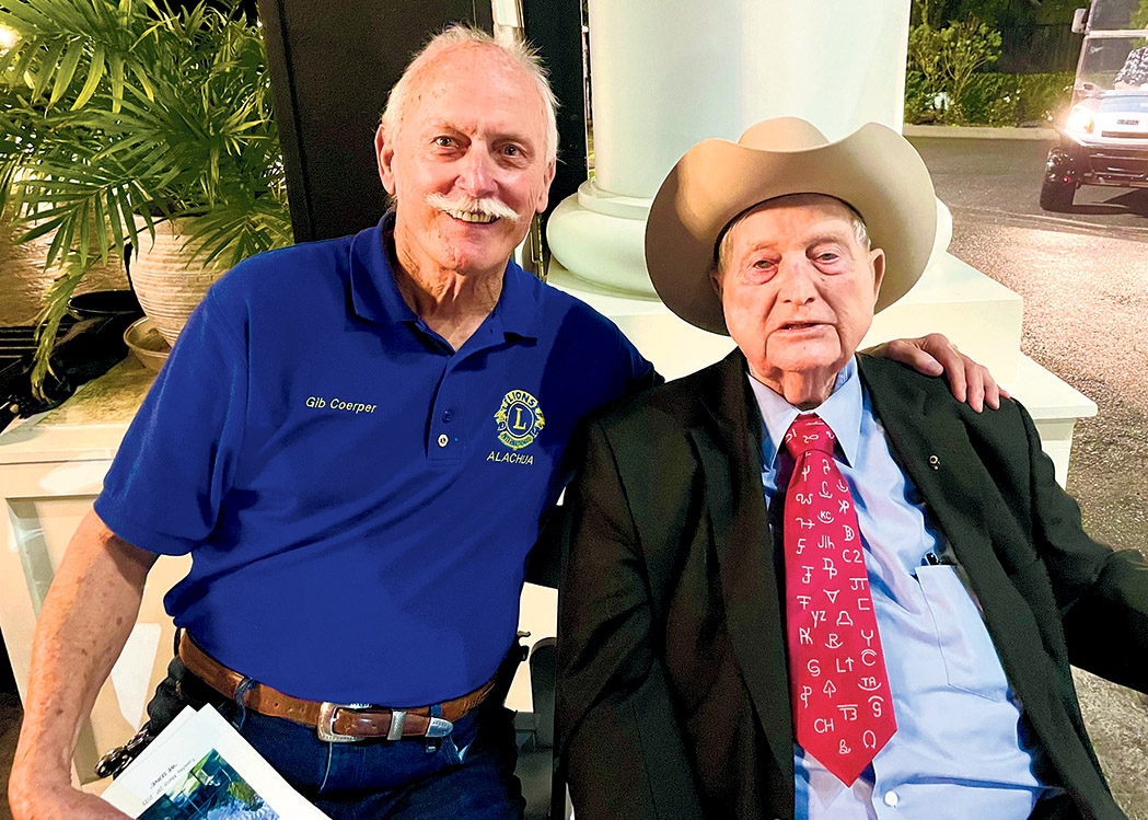 L-R: Alachua Mayor and Lions Club member Gib Coerper and Lions Club member Ralph Cellon. Cellon was honored with the Lions Club International Melvin Jones Progressive award at the 83rd Cattlemen’s Banquet
