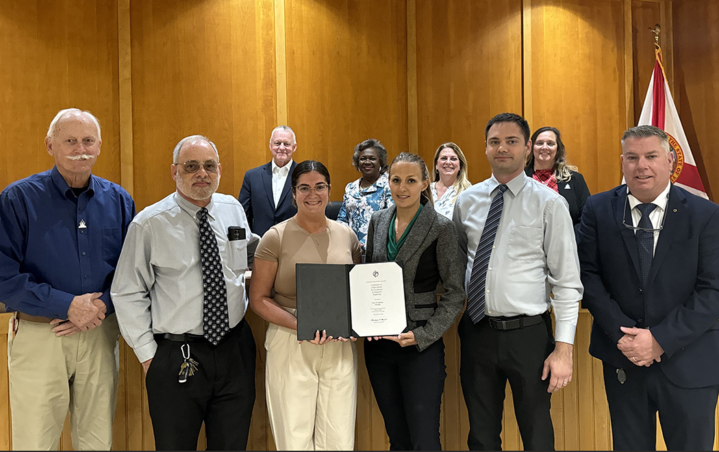 Front L – R: Alachua Mayor Gib Coerper, Finance and Administrative Services Director Robert Bonetti, Accounts Payable Specialist Katelynn Bayles, Accounting Manager Heather Carter, Accounting Manager Tyler Williams, City Manager Mike Daroza. Back L-R: Commissioner Ed Potts, Commissioner Shirley Green Brown, Vice Mayor Dayna Miller, Commissioner Jennifer Blalock. Not Pictured: Senior Accountant Regina Reed