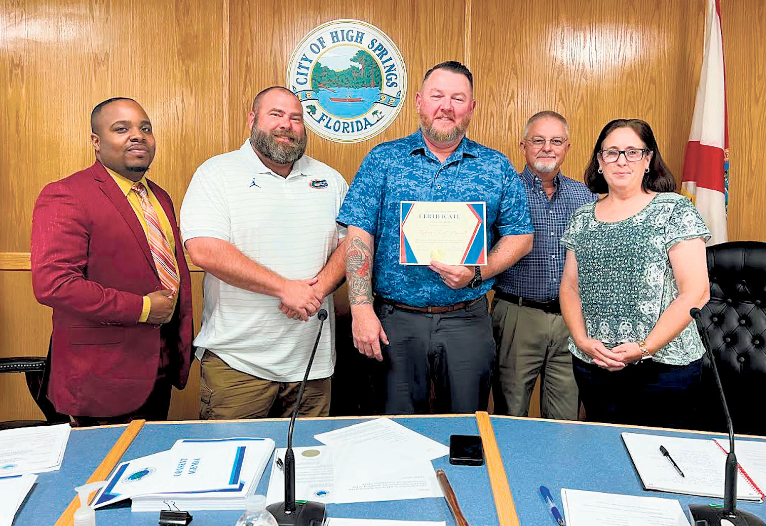 High Springs Commissioner Robert Chad Howell, center, was honored as the 2025 High Springs Hero during the Sept. 22 City Commission meeting. Joining him for the recognition are, from left, Vice Mayor Andrew Miller, Mayor Tristan Grunder, Commissioner Wayne Bloodsworth Jr. and Commissioner Katherine Weitz. / Photo special to Alachua County Today