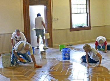 W - HS Community Cleaning the tile